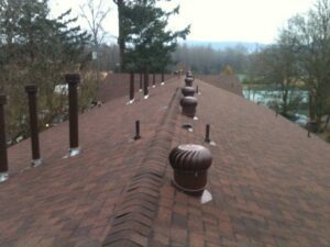 A roof with many vents on it